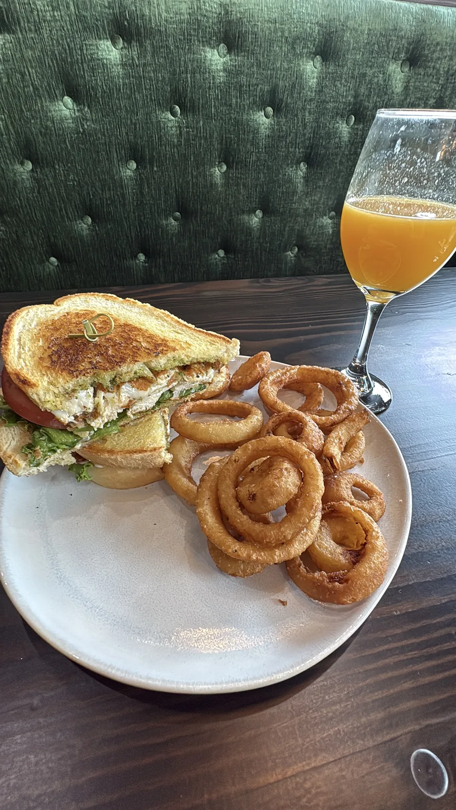 Breakfast wrap with onion rings and orange juice at Urban Kitchen