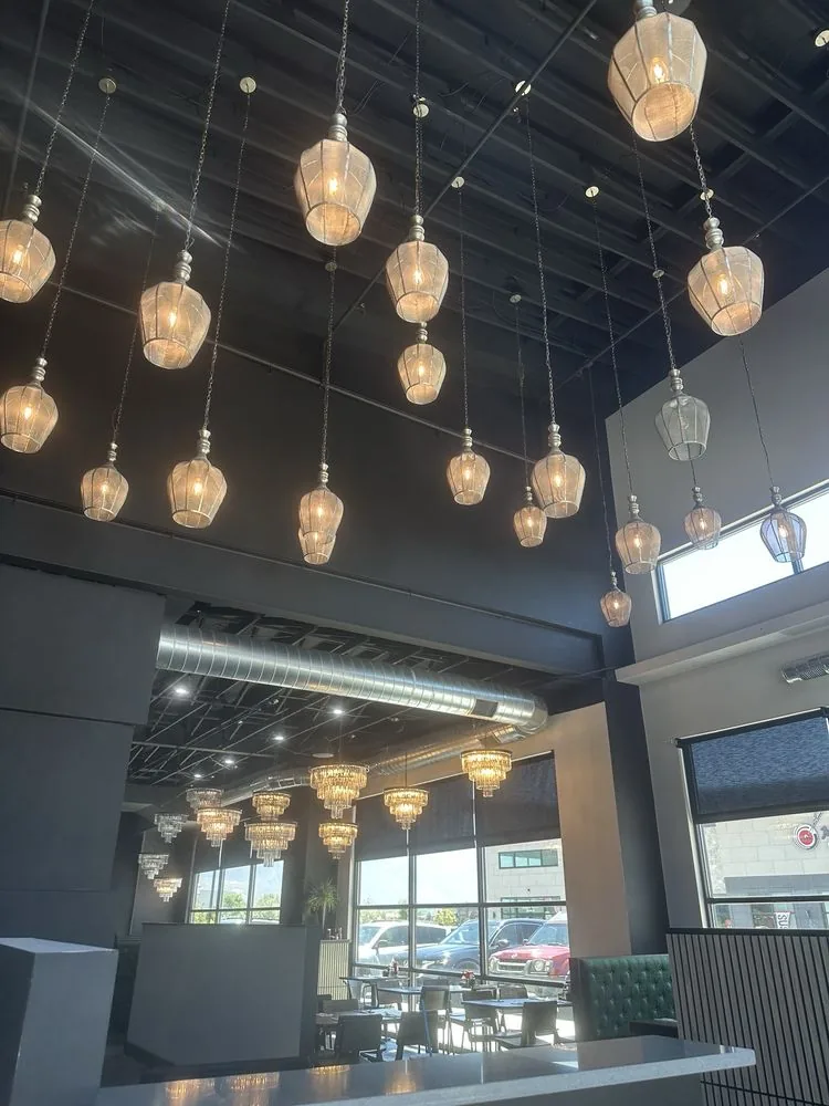 Pendant lights and dining room details inside Urban Kitchen in Pleasant Grove